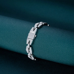 Hip hop silver cuban link bracelet with micro-pave diamonds on dark green pillar