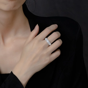 Elegant 925 silver ring featuring three rows of irregular baguette zircon stones for women