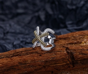 Macro shot of S925 silver ring featuring layered hollow cross design with micro-pave crystals