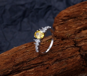 Detailed macro view of 925 sterling silver stamp on vintage yellow oval ring band
