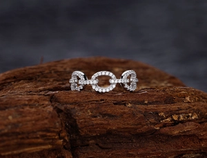 Macro shot of S925 sterling silver interlocking chain link ring with micro pave cubic zirconia