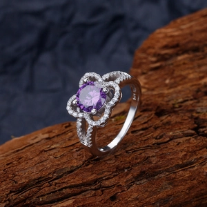 Elegant 925 sterling silver ring with 7.5mm purple round gem in floral micro-pave setting