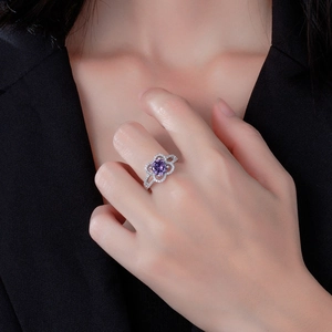 Elegant 925 sterling silver ring featuring a 7.5mm purple crystal in a floral micro-pave setting