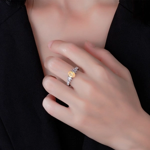 Fashion 925 silver ring featuring an oval yellow diamond and side stone embellishments