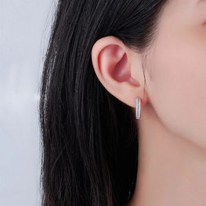 Elegant S925 sterling silver Mobius hoop earrings with shimmering pave micro-set diamonds