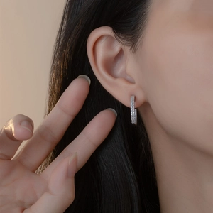 S925 sterling silver half-hoop earrings featuring double-row pavé crystals on model