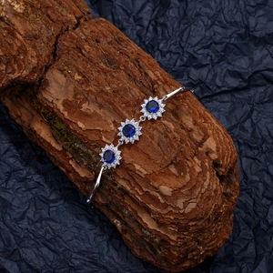 Bracelet tournesol en argent 925 avec saphirs ronds de 6mm et entouré de diamants blancs