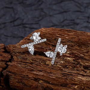 Irregular S925 sterling silver stud earrings featuring geometric pear-cut sparkling zircon