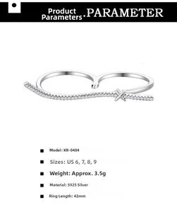 Detail view of S925 sterling silver double-finger ring with CZ stones and X design