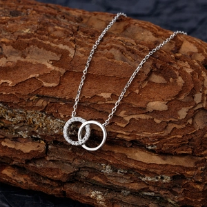 Collier double anneau entrelacé en argent sterling S925 avec pavé de zircons brillant