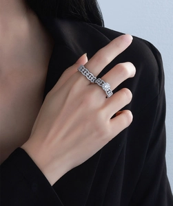 Macro shot of S925 sterling silver stacked rings with micro-pave white zircon stones