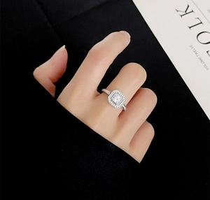 Macro shot of S925 silver square cut halo ring with pave set micro diamonds