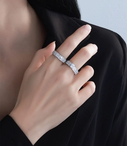 Macro shot of S925 sterling silver stacking rings with sparkling diamond accents