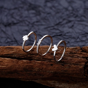 Three-piece S925 sterling silver ring set with clover, heart, and crystal charms