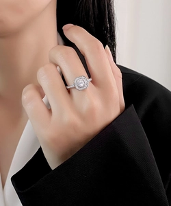 Close-up of S925 silver square halo ring with micro-pave diamonds on model's hand