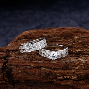 Stackable S925 sterling silver ring set with sparkling zircon stones on dark wood