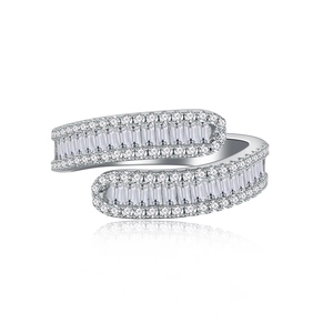 Sparkling S925 silver bypass ring with baguette-cut diamonds and pavé border on white surface