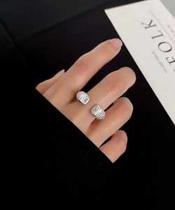 Detailed view of S925 sterling silver open ring with dual rectangular zirconia stones