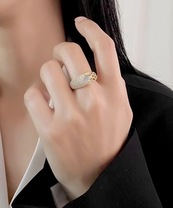 Detailed view of gold plated S925 silver mesh ring with micro paved pavé zircon stones