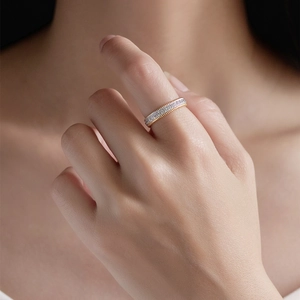 Two-tone S925 sterling silver twist ring with gold-plated edges and paved zircons