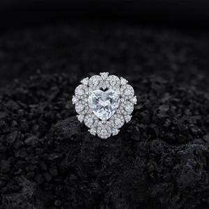 Exquisite S925 silver ring featuring a large heart-shaped diamond and sparkling halo gems