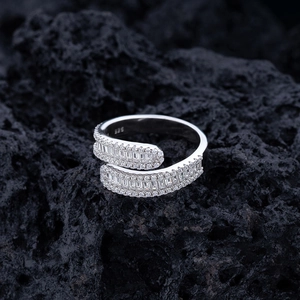 Luxurious S925 sterling silver crossover ring featuring full baguette and round cubic zirconia
