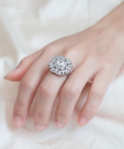 Close-up of S925 silver ring featuring a large square diamond in a double halo setting