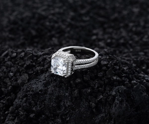 Detailed macro view of S925 sterling silver ring with large square diamond engraving