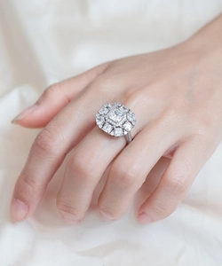 Macro view of S925 silver ring with radiant full diamond pave in geometric square design