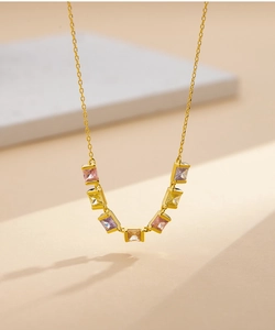 Close-up of S925 silver necklace with seven multicolor square-cut sugar cube gemstones