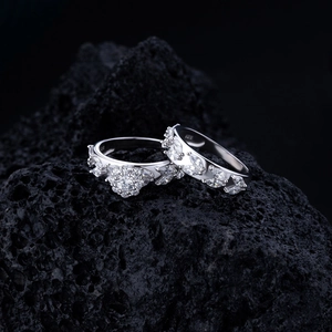 Macro detail of S925 sterling silver leaf cluster rings with pavé set marquise cubic zirconia