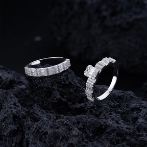 Silver square-cut diamond rings set on black volcanic stone for a luxurious look