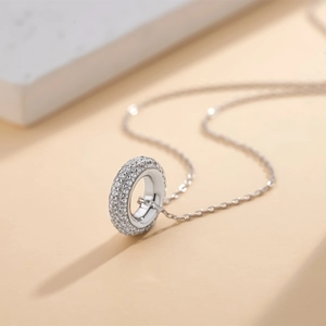 Minimalist S925 sterling silver circular ring necklace with sparkling pavé cubic zirconia