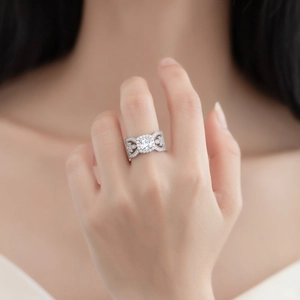 Elegant S925 silver wide leaf ring with halo setting and pave diamonds on hand