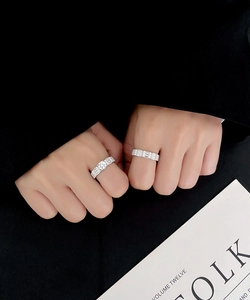Detailed view of S925 silver ring set with round and baguette-cut cubic zirconia stones