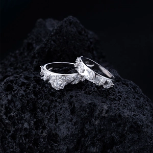 S925 sterling silver ring set with marquise leaf design on dark volcanic rock