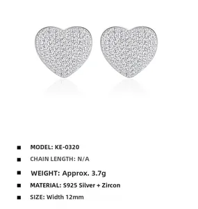 Macro detail of S925 silver double heart stud earrings with cubic zirconia pavé