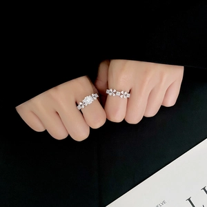 Elegant S925 sterling silver flower rings with sparkling cubic zirconia on hand