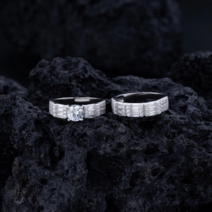 Elegant S925 sterling silver couple ring set with round and baguette diamonds on black stone