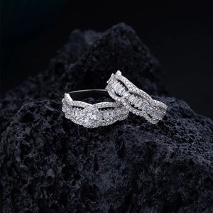 Elegant wavy S925 sterling silver rings with micro-pave cubic zirconia on volcanic rock