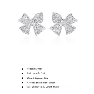 Macro shot of S925 sterling silver bow earrings with pave cubic zirconia and dimensions