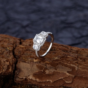 Elegant S925 sterling silver ring with three emerald-cut main stones and pavé accents