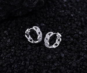 Detail of S925 sterling silver chain earrings with micro-paved white cubic zirconia