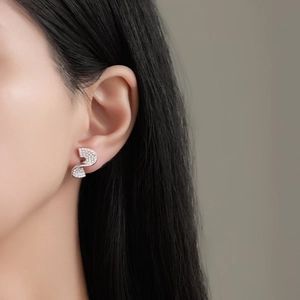 Elegant S-shaped sterling silver stud earrings with sparkling pavé zircons for women
