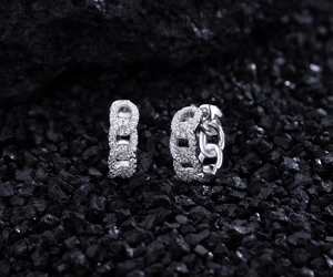 Close-up of S925 sterling silver chain hoop earrings with micro-paved sparkling zircons
