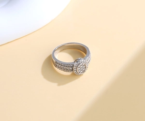Macro shot of S925 sterling silver ring with oval pave zircon and detailed side diamonds