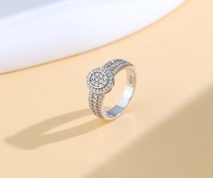 Detailed macro view of S925 sterling silver stamp on a sparkling oval halo ring