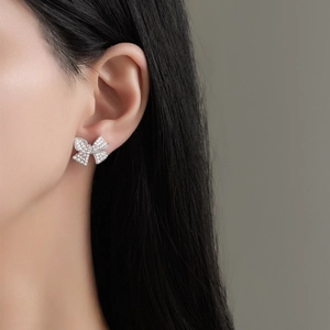 Exquisite S925 sterling silver bow earrings featuring sparkling micro-pave crystals
