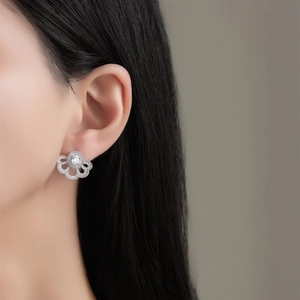 S925 silver fan-shaped flower stud earrings with brilliant zircon on a female model