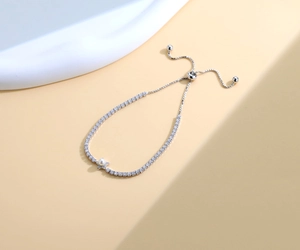 Detail of S925 sterling silver star bracelet with pearl and micro-pave cubic zirconia